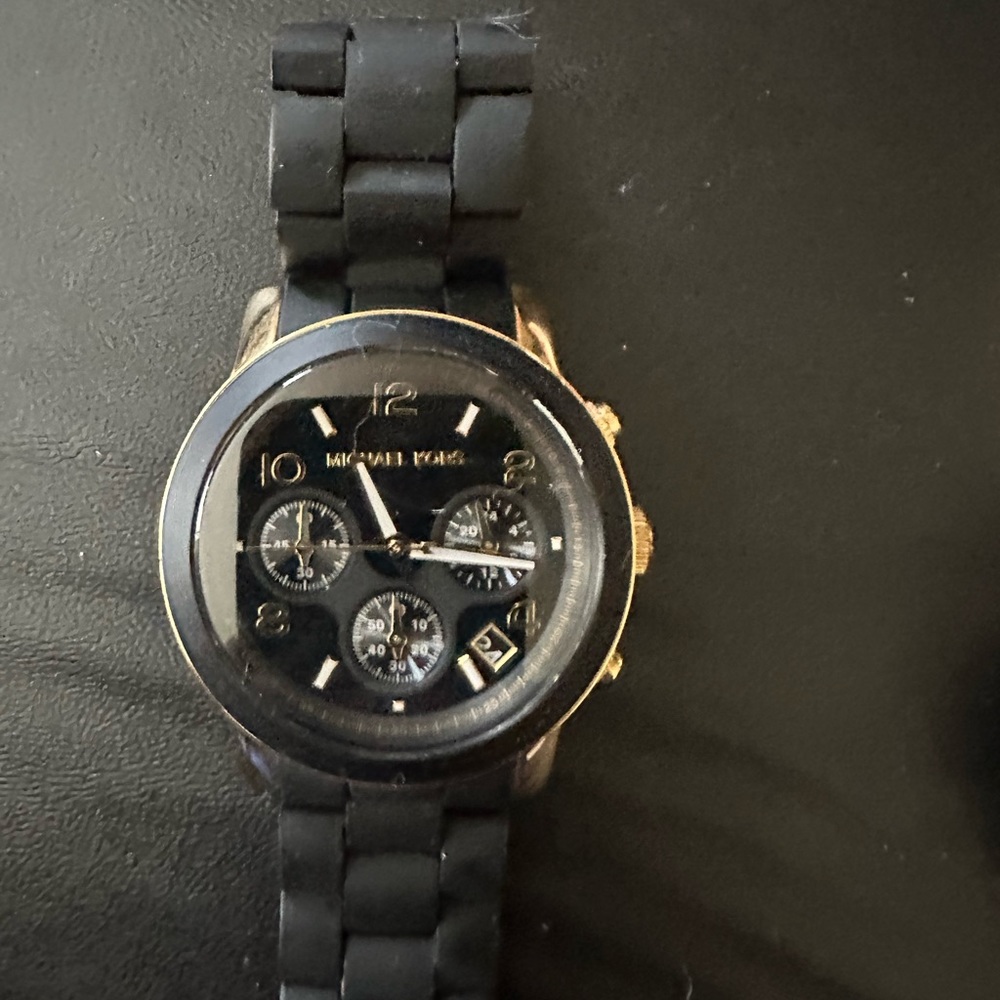 Michael Kors womens watch. Black on gold